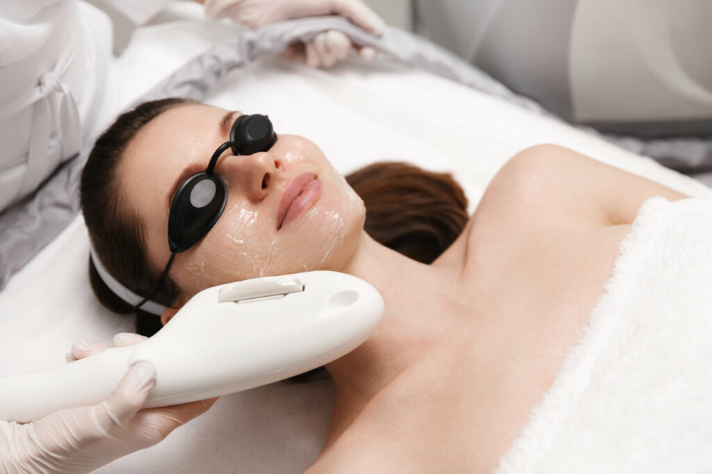 Anti aging cosmetology and beauty treatment product, woman using laser device for skin resurfacing as rejuvenation procedure and skincare routine | Coral Springs Med Spa in Coral Springs, FL